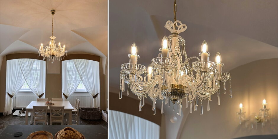 Schlossküche mit Design-Kristalllüster und Wandleuchte